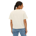 Woman wearing a plain white t-shirt and blue jeans on a white background