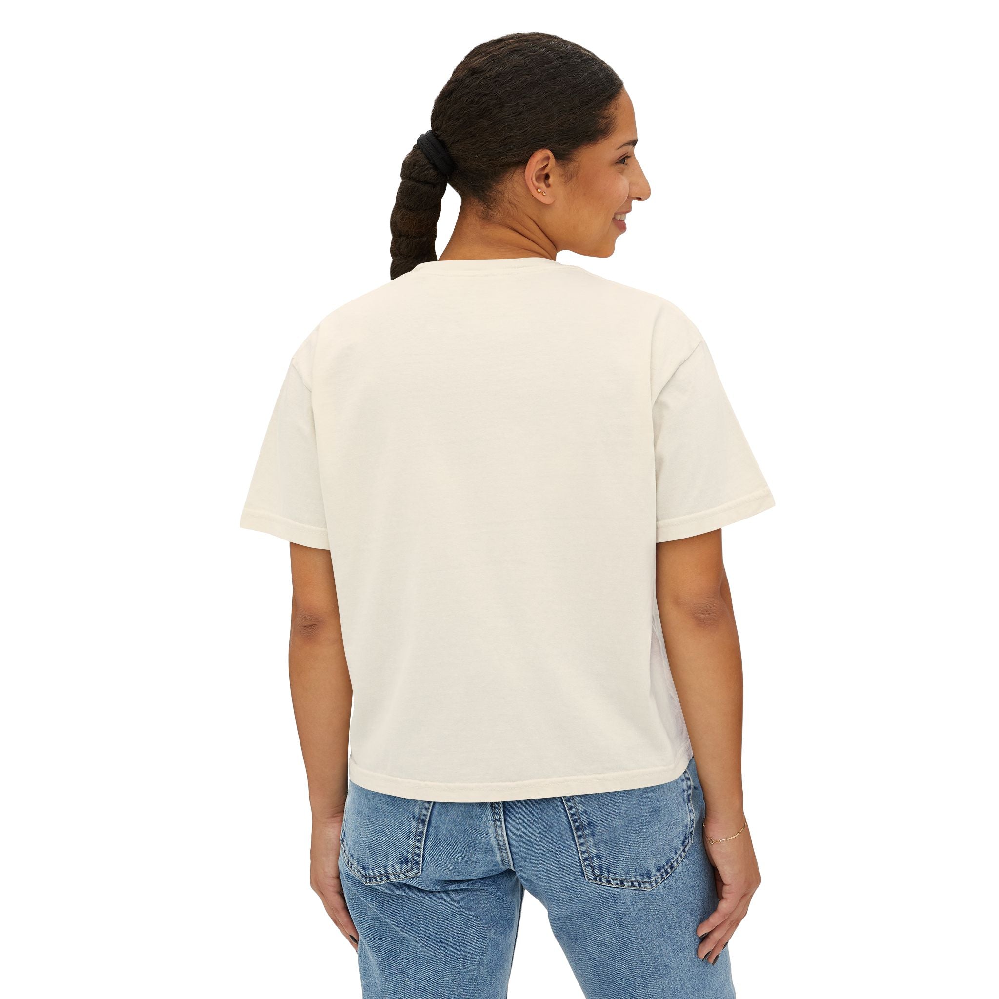Woman wearing a plain white t-shirt and blue jeans on a white background