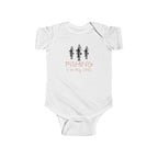 White baby onesie with 'Fishing is in my DNA' text and fish illustrations on a white background