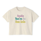 Beige t-shirt with 'Smile You're in Sea Isle' text on a white background