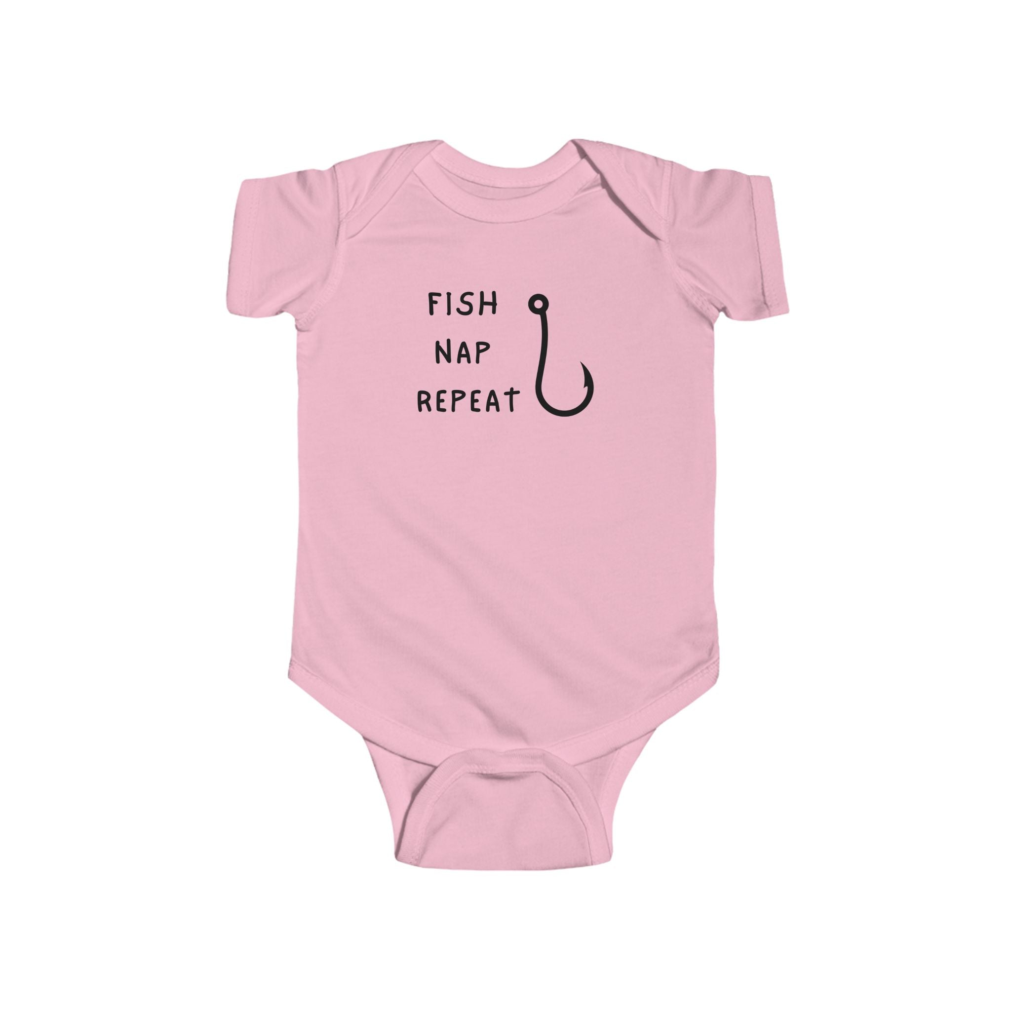 Pink baby onesie with 'Fish Nap Repeat' text and fish hook graphic on a white background